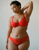 woman wearing red lace underwire bra and matching panty