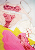 Light pink bra, with dark pink panel, and matching panty. Pink and yellow slips.  