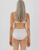 Back shot of woman wearing white high-waist cotton panty with white scallop trim on waist and leg openings with matching bralette.