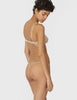 On model image of backside of y-thong in nude/beige and matching bralette