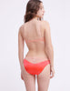 Woman wearing pink and peach silk wireless bralette and matching panty  by Araks