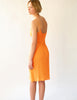 back view of orange dress