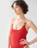woman wearing red one piece with anchor detail by Araks