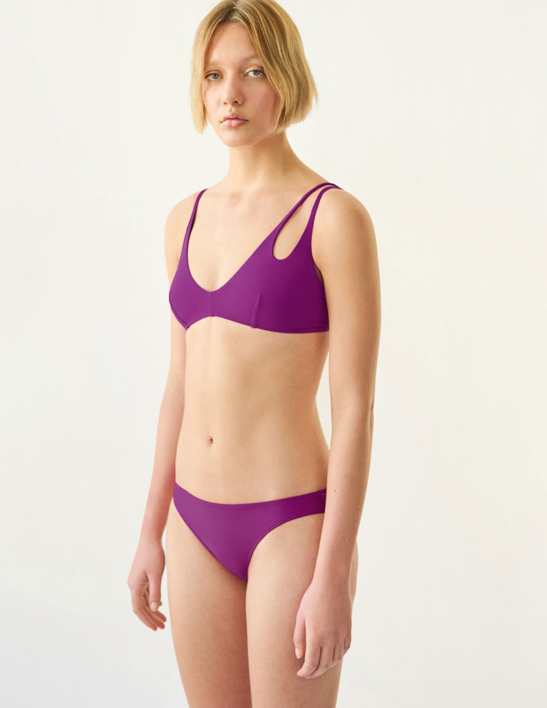 purple bikini top and bottom on model