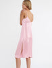 woman wearing pink silk slip dress by ARaks