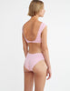 back of woman wearing pink bikini by Araks