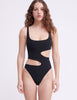 woman in black swimsuit with cutouts