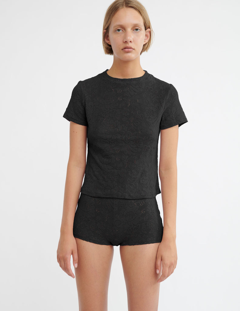 woman wearing black lace t-shirt and shorts by Araks