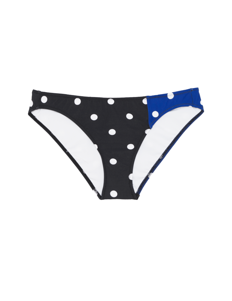 Asymmetrical color-blocked navy and blue based, white polka dot, low-rise bikini bottom