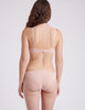 back view of nude silk bra and panty