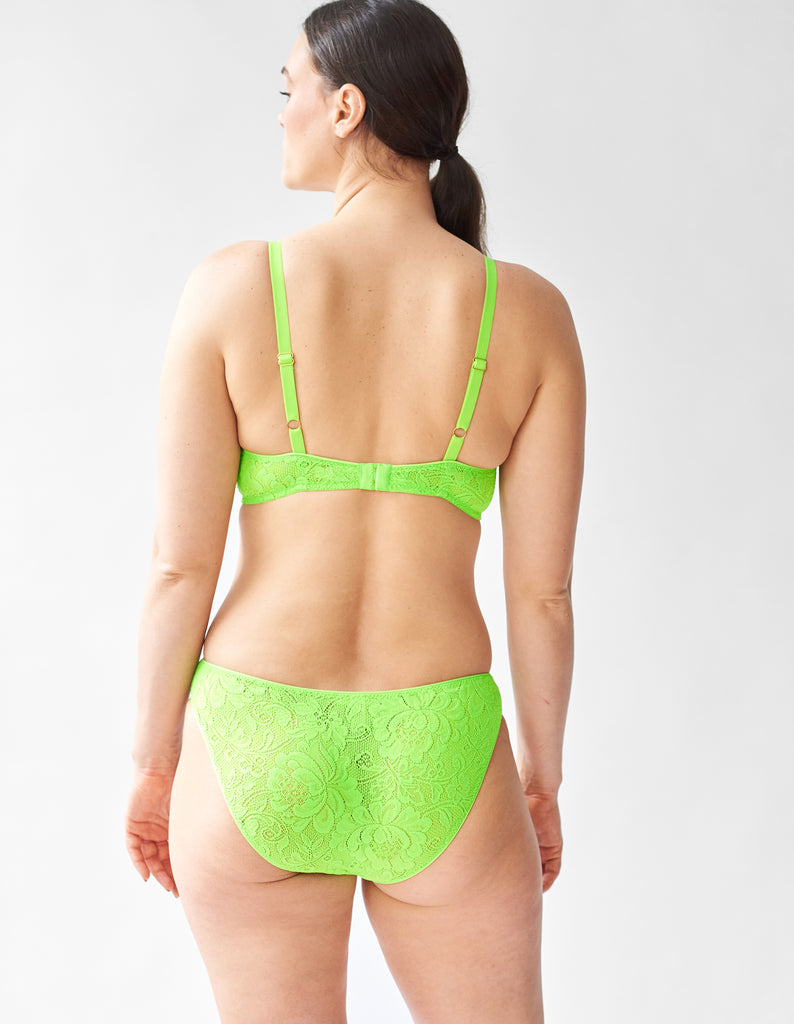 Backview of Woman wearing the green lace Tamara Bralette and Tris lace panty.