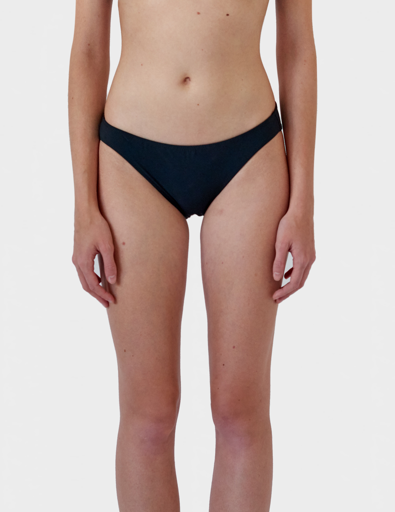 Front shot of woman wearing black bikini bottom