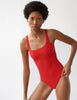 woman in red one piece