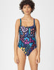 Front shot of woman wearing  navy floral  one-piece