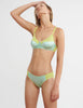 woman wearing green cotton bra with blue silk insert and matching panty by Araks