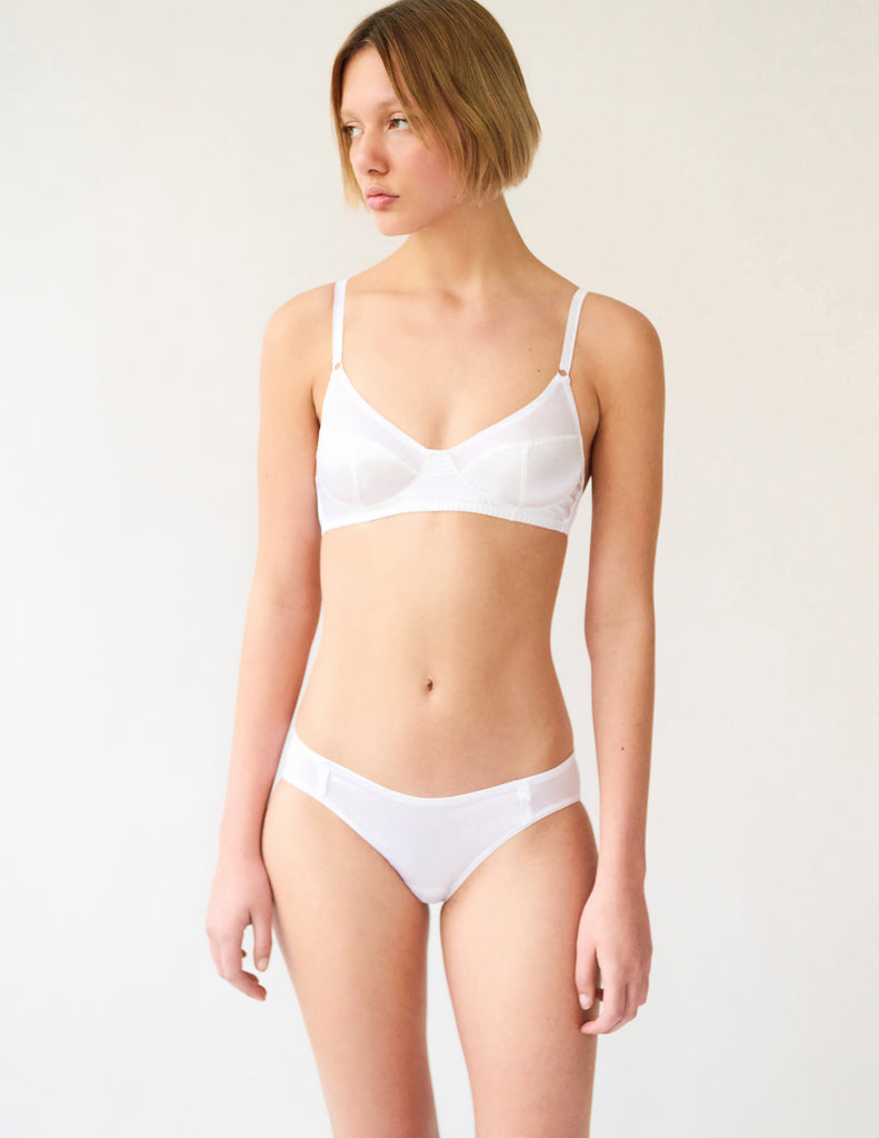 On model image of white silk panty and bralette