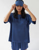 woman wearing blue silk t-shirt and matching shorts and eye mask by Araks