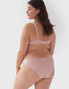 Back view of woman wears beige mesh underwire bra and matching panty. 
