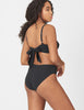 Back view of Woman wearing a black two piece swimsuit
