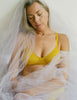 woman wearing yellow lace bra by Araks